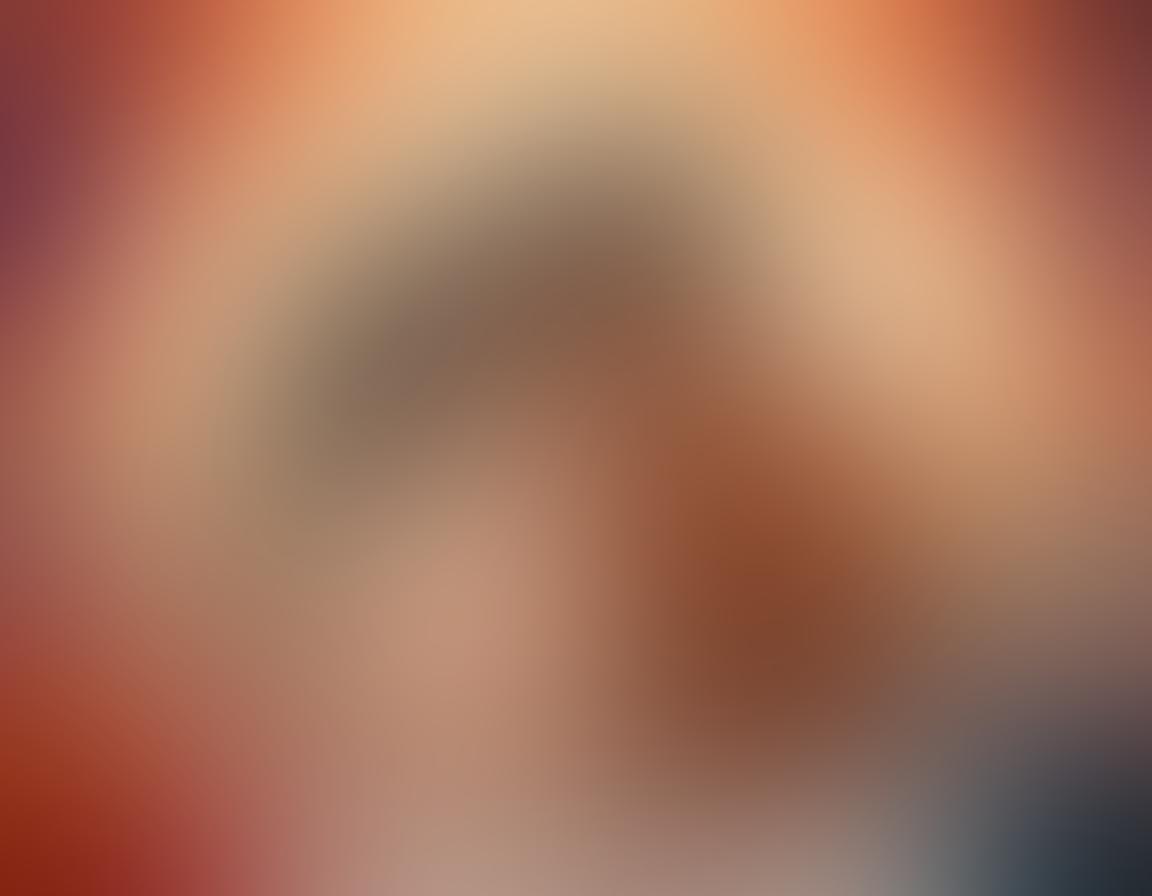 A sophisticated and tasteful illustration of a couple enjoying an intimate moment, surrounded by soft, warm lighting and tasteful decorations that evoke a sense of romance and relaxation. The background features subtle hints of screens showing abstract forms of erotic art, promoting the theme of adult entertainment. Incorporate elements symbolizing exploration, such as a compass and a map intertwined with delicate floral motifs. The scene should convey a sense of intimacy and discovery in the world of erotic content. vibrant colors. soft focus.